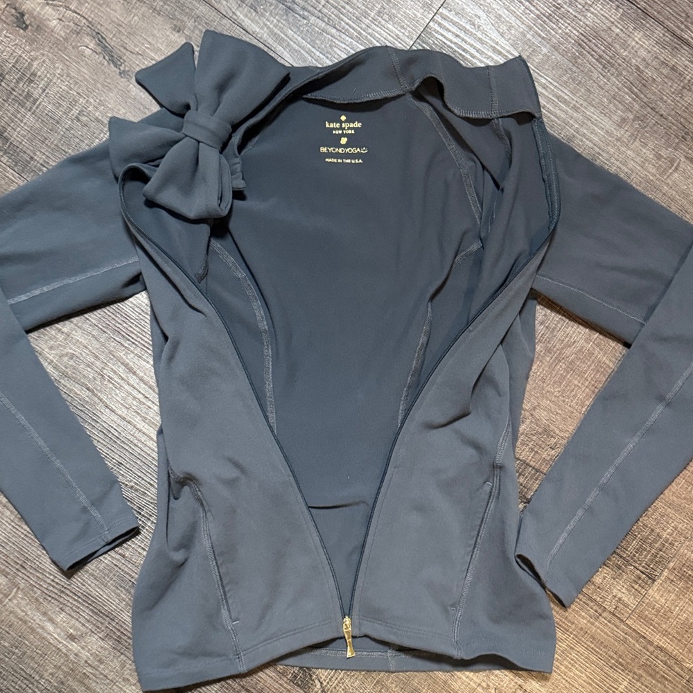 Kate Spade x Beyond Yoga Neck Bow Front Zip Jacket. - Picture 7 of 13